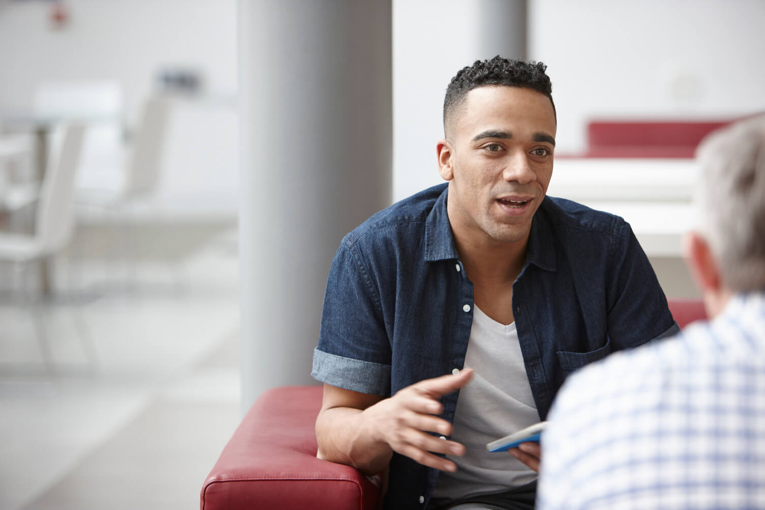 Man in conversation